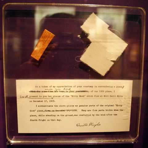 Fragments of the Wright Fflyer taken aboard STS-51-L By RadioFan (Own work) [CC BY-SA 3.0 (http://creativecommons.org/licenses/by-sa/3.0)], via Wikimedia Commons